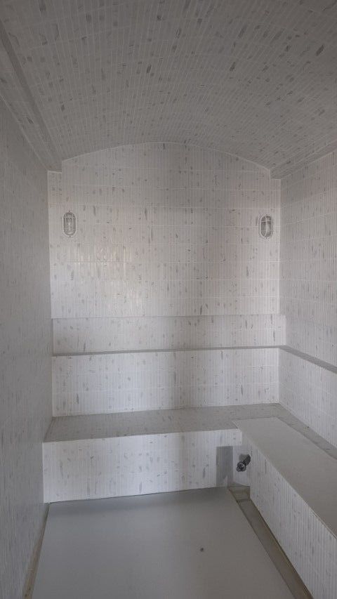 Villa Unity spa level with outdoor sala and garden views